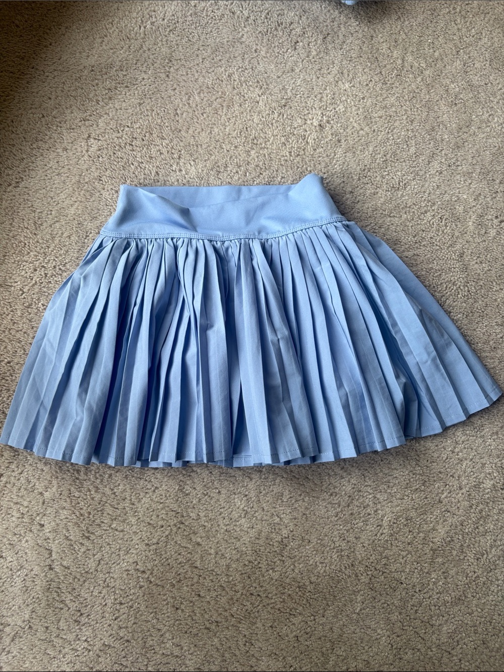 Originality pleated skirt sold at Dillards. Light blue, size M girls.